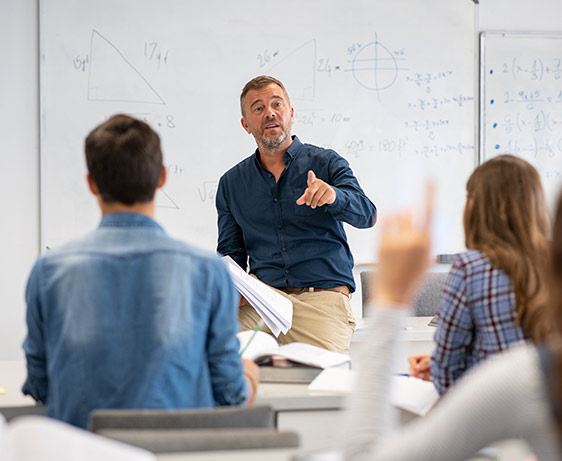 training speaker talking in a classroom of adults